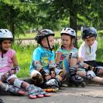 Роликовые коньки