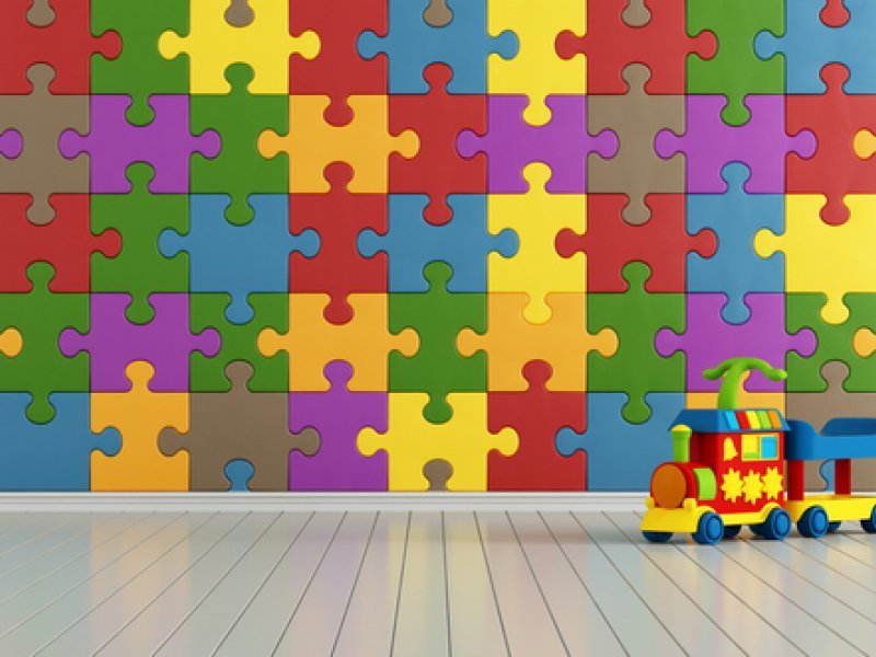 пазл из разноцветных деталей в виде коврика
