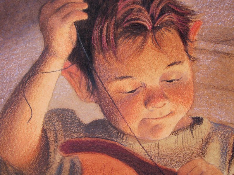 Мальчик шьёт