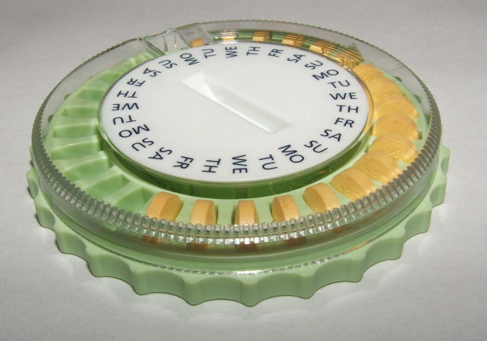 Противозачаточные таблетки в контейнере