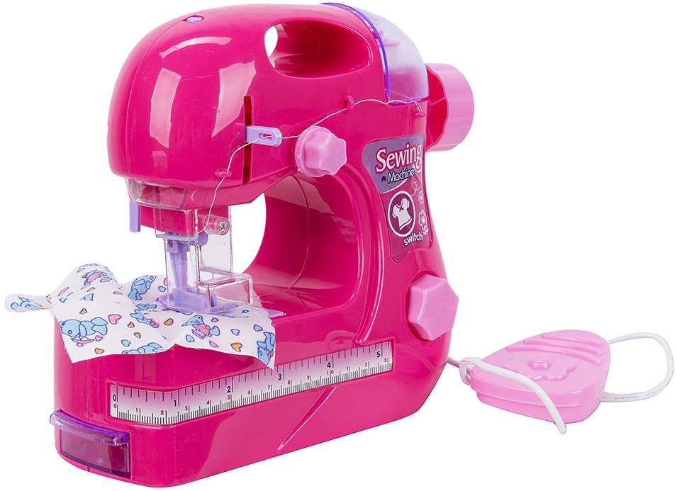 Игрушечная швейная машинка